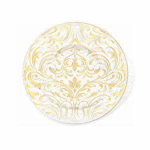 Decorative plate with gold intricate design on a white background