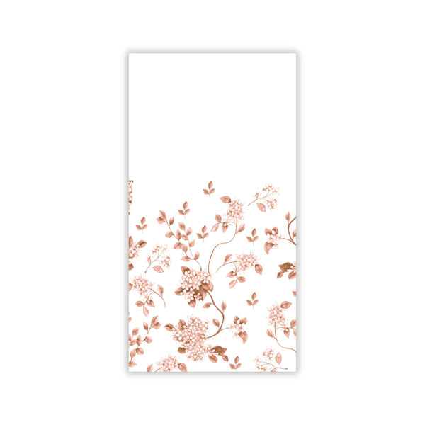 Floral patterned paper napkin with copper-colored flowers on a white background