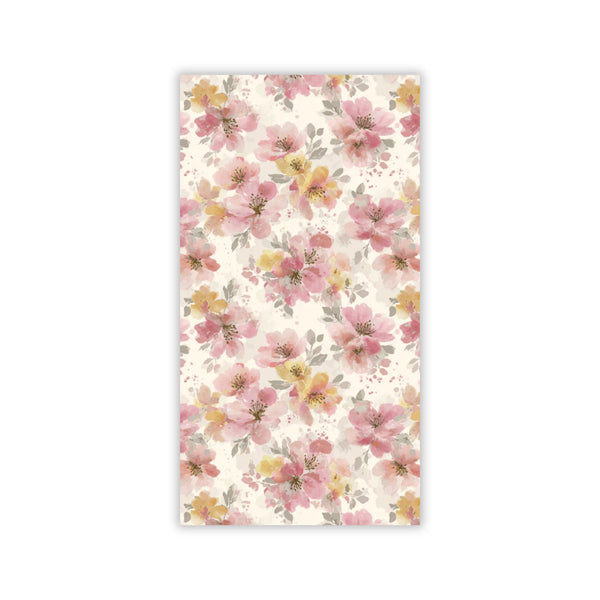 Floral patterned paper napkin with pink and yellow flowers on a white background