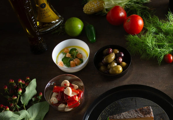 Assorted small plastic dessert bowls with gold accents