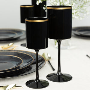 black and gold plastic wine glasses arranged on a table