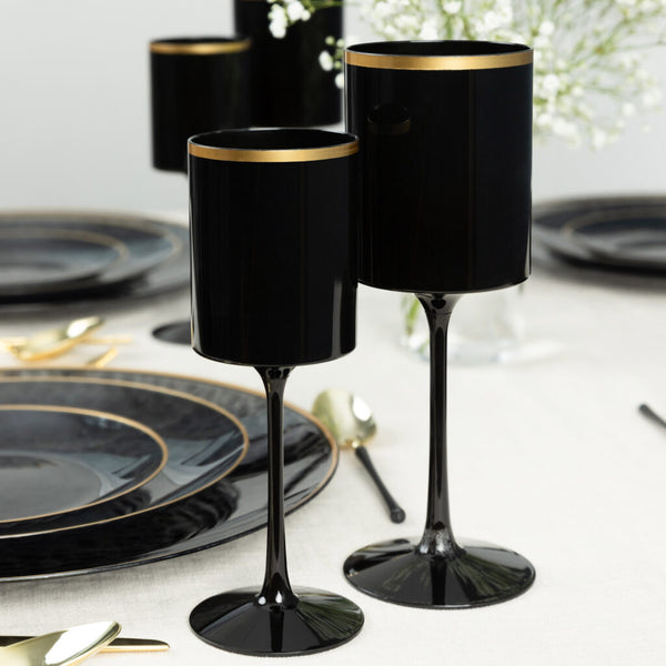 black and gold plastic wine glasses arranged on a table