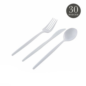 Set of white plastic cutlery on a white background