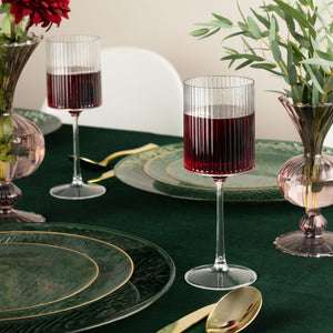8.5 oz ribbed pattern stemmed plastic wine goblets styled on elegant table setting