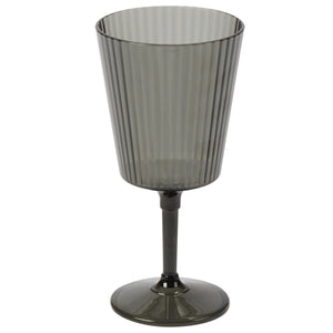 Dark gray wine glass with ribbed design on a white background